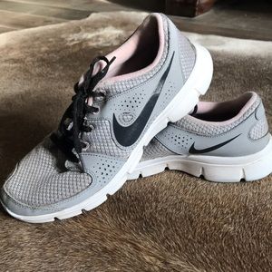 Gray with pink trim Nike’s
